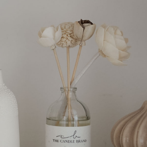 Flower Diffuser with flower embossed label closeup