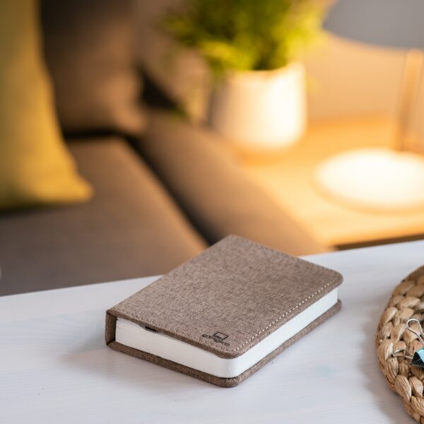 Gingko smart mini book light in coffee on table