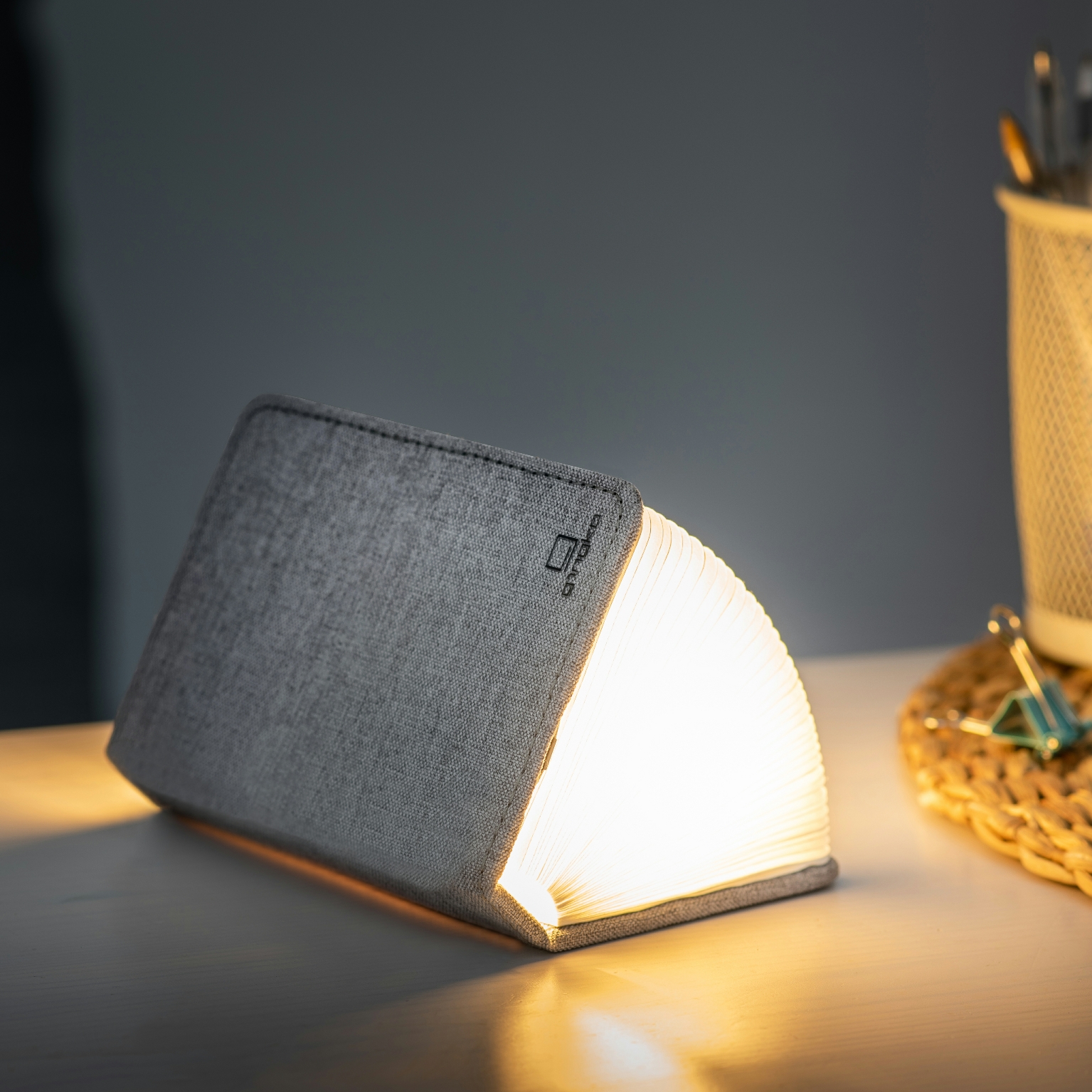 Gingko smart mini book light in coffee part opened on table