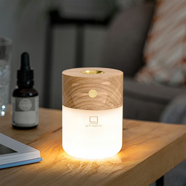 Smart Diffuser light in White Ash lit on desk