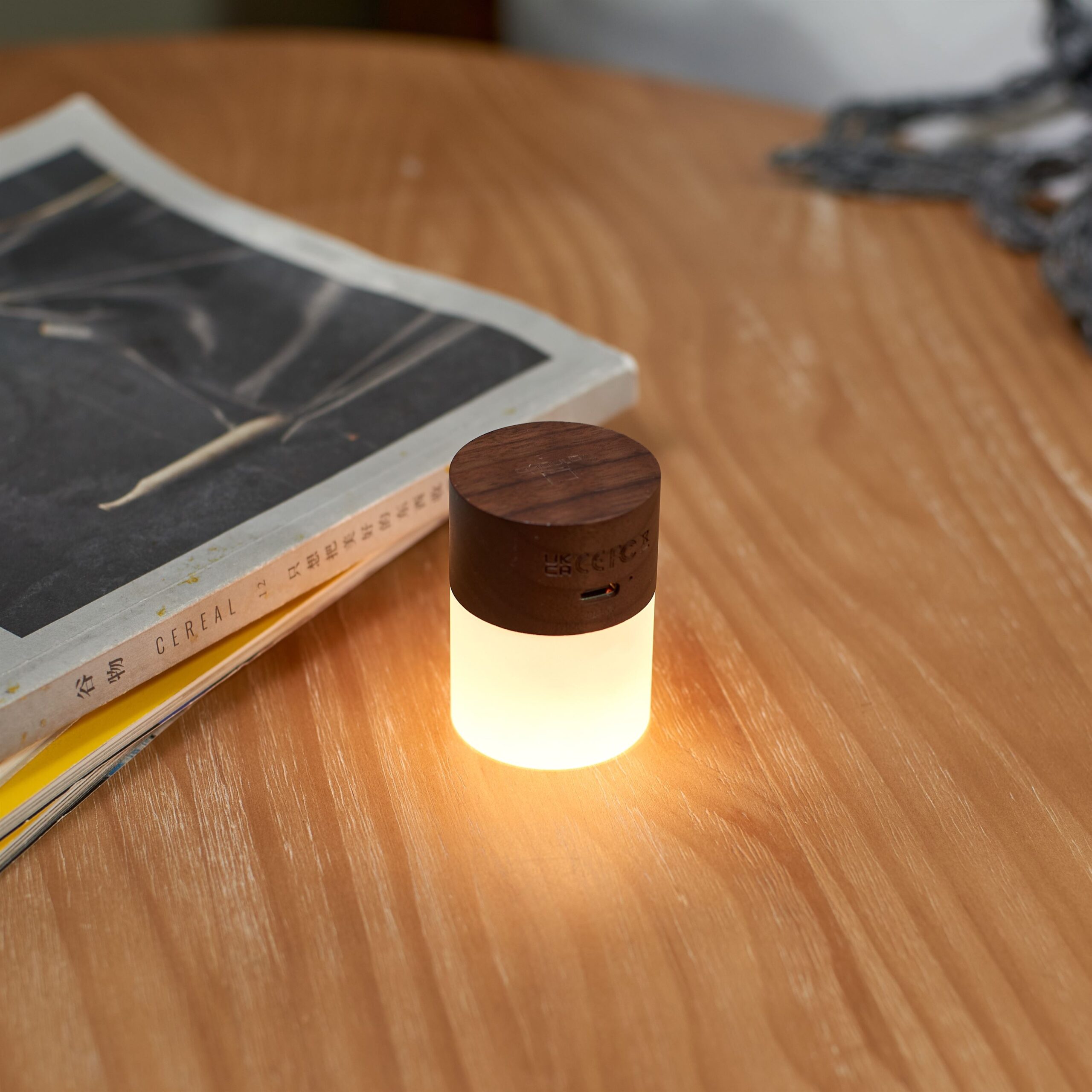G026WT Gingko Lemelia Light Walnut on wooden table Lit