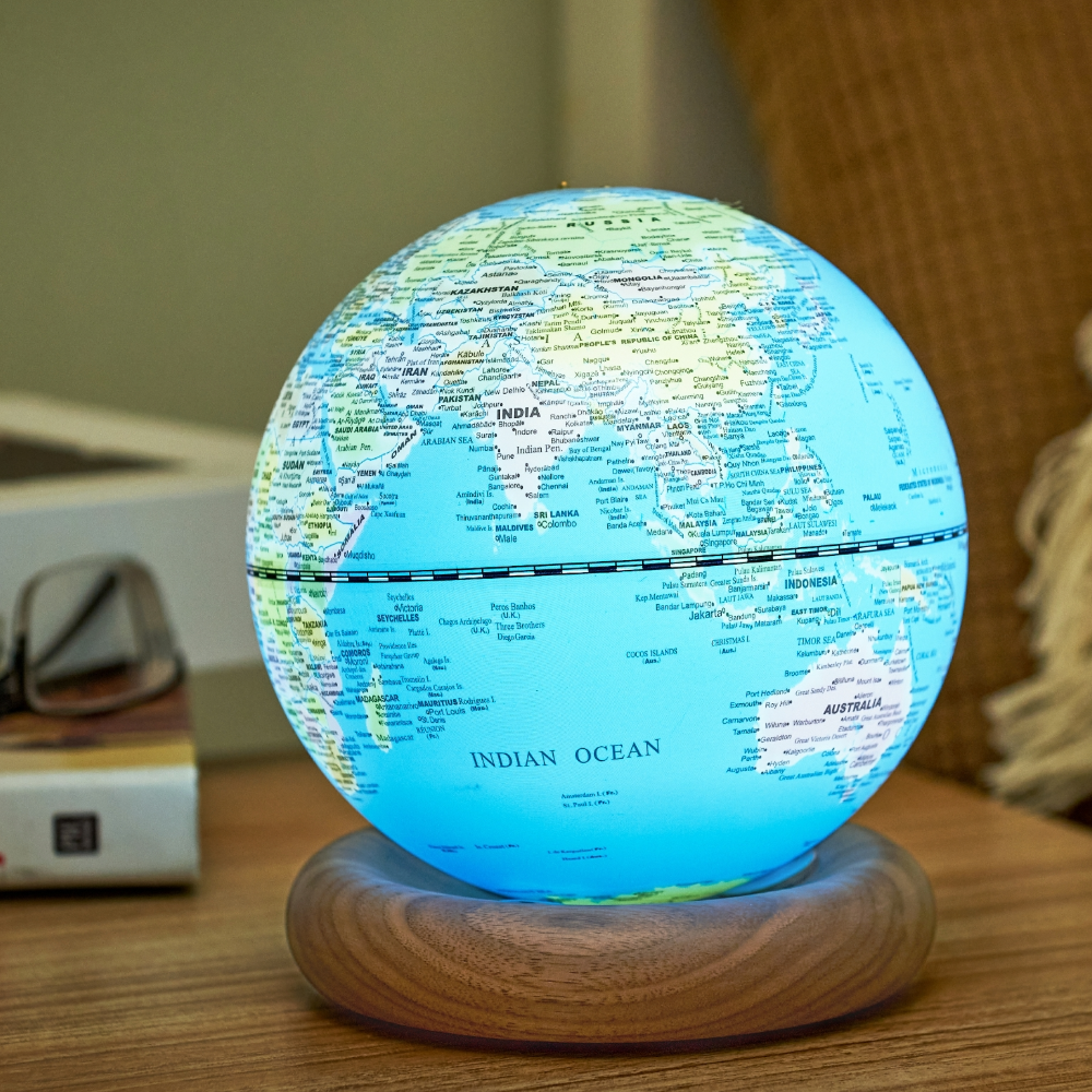 Gingko Mini Light Blue Atlas Globe with White Ash Base lit