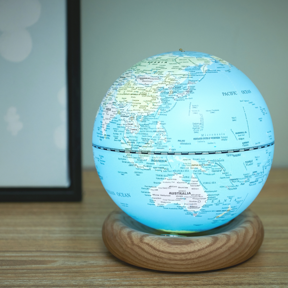 Gingko Design Mini Light Blue Atlas Globe with White Ash Base