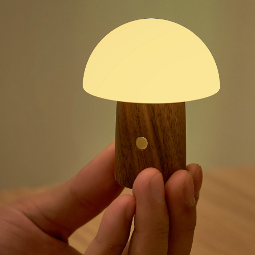 Gingko Design Super Mini Alice Mushroom light - white light held in fingers